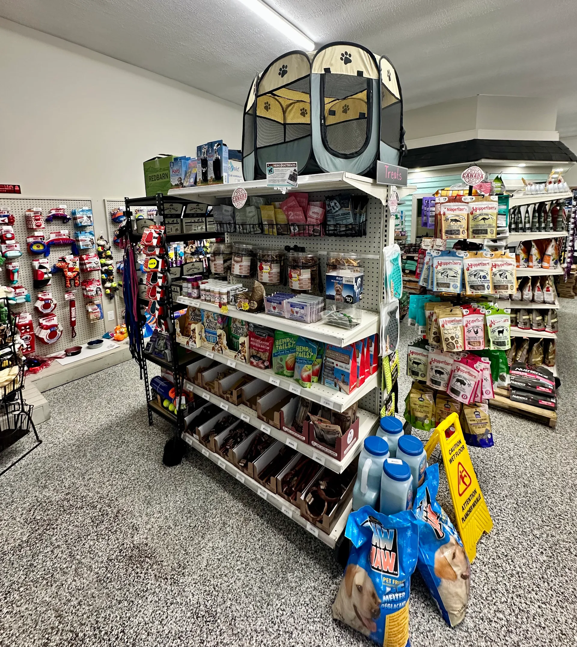 Dog treats aisle display at PTM Pet Supplies