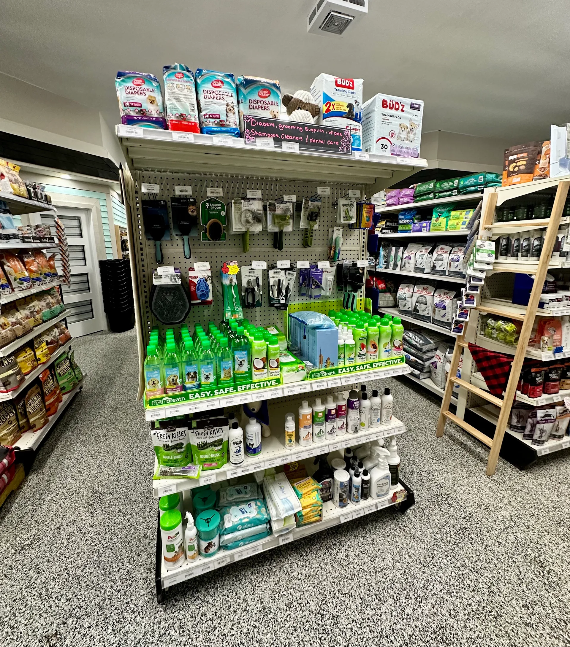 Pet shampoos and grooming products display at PTM Pet Supplies